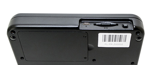 image of the back edge and battery compartment of device